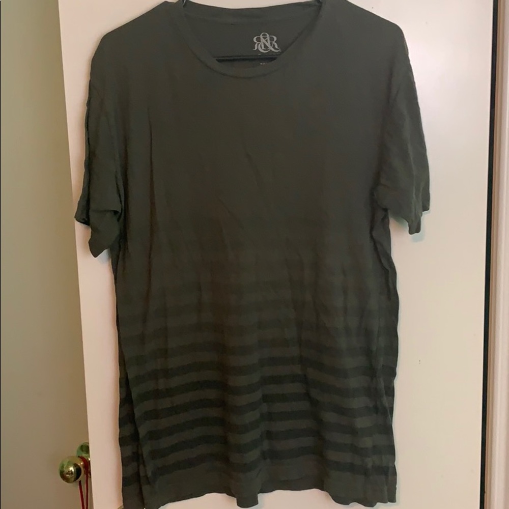 Green faded shirt. Striped.